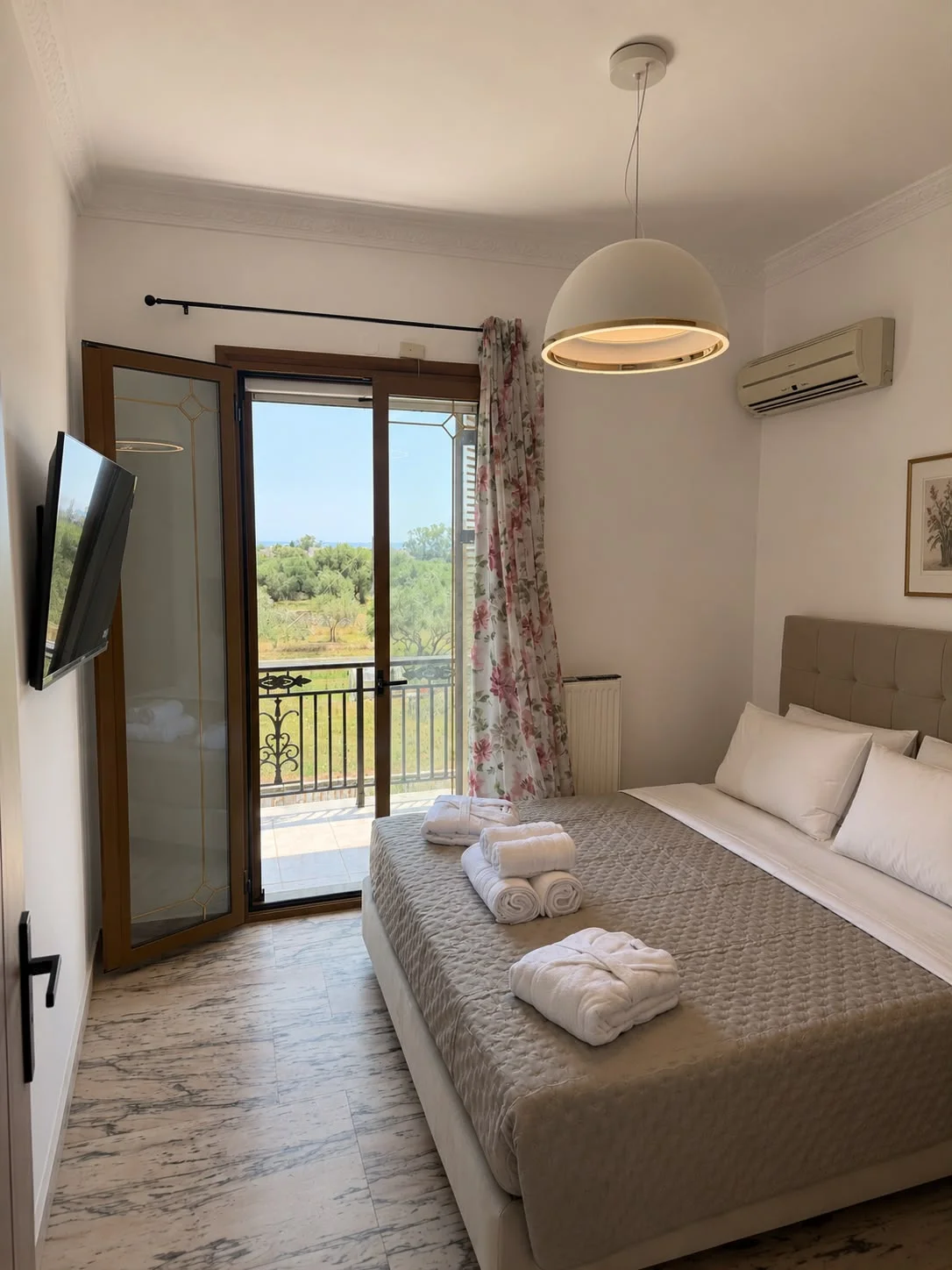 Main double bedroom with patio doors onto the balcony