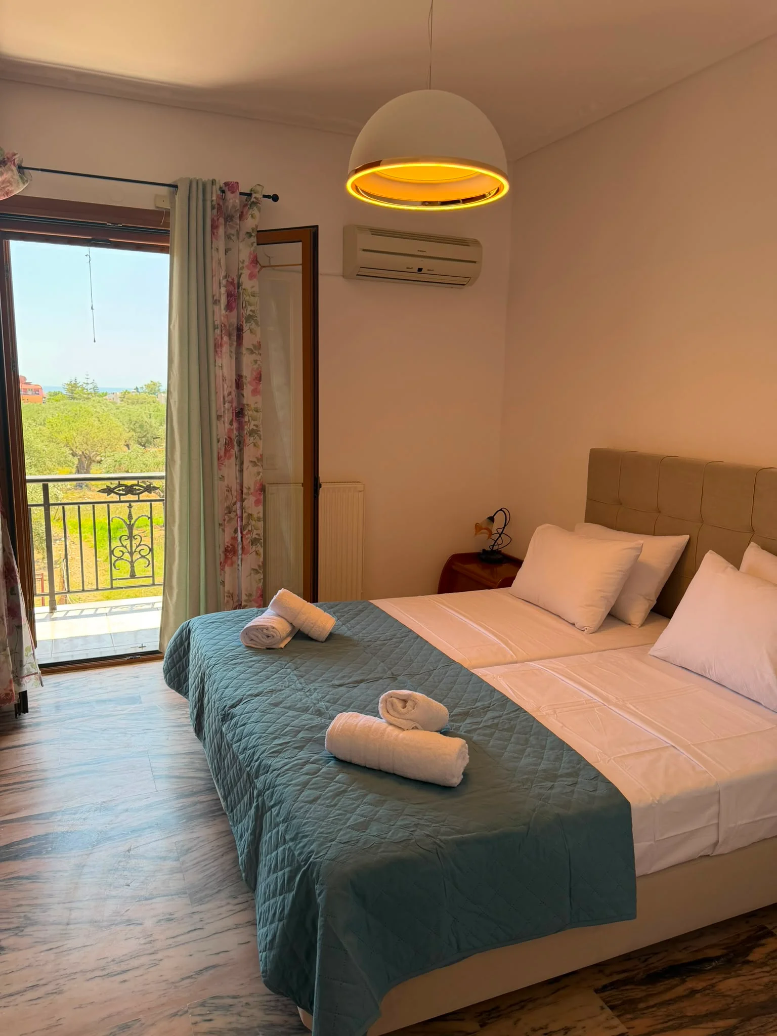 Third double bedroom with patio doors onto the balcony